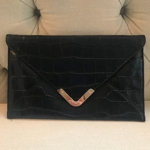 Black envelope clutch